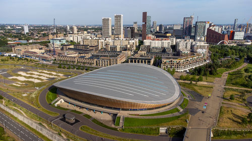 High angle view of modern buildings against sky