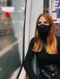 Portrait of a beautiful woman in train