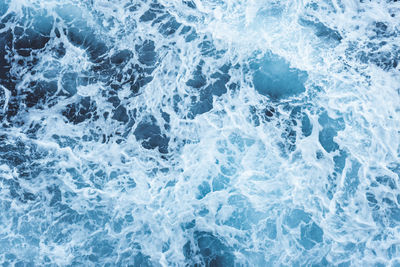 Top down view of whitewater leaving a pattern on the mediterranean sea.