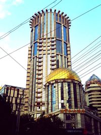 Low angle view of skyscraper against clear sky