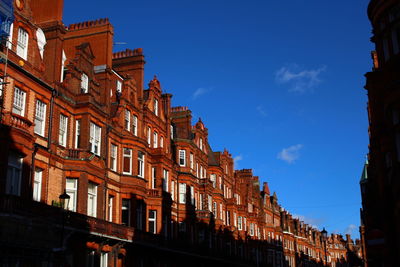 Low angle view of buildings against sky