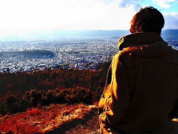 Woman looking at cityscape