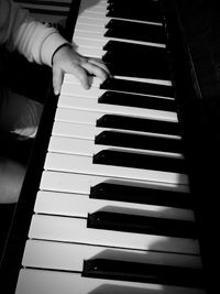 Shadow of person playing piano