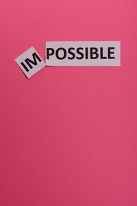 Close-up of text on red background