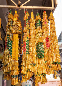 Colorful decoration hair thread rajputi paranda kept for sell at festival from flat angle