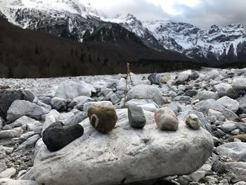 Rocks on snow covered land