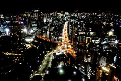 Aerial view of illuminated cityscape