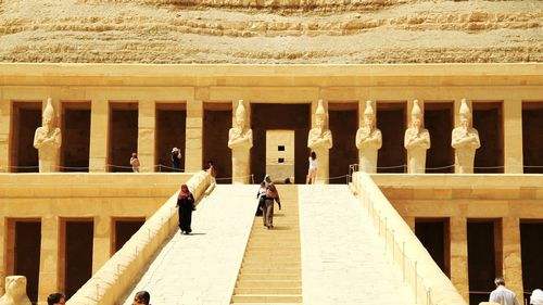 Tourists in front of building