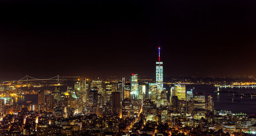 Illuminated buildings in city at night