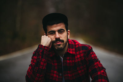 Portrait of young man looking away