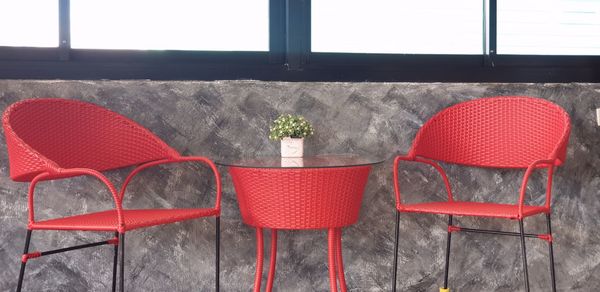 Empty chairs and tables in cafe