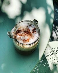 High angle view of coffee cup on table