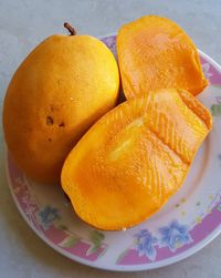 High angle view of orange slice in plate