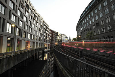 View of street and buildings against sky