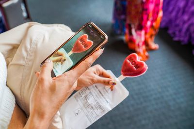 Close-up of hand holding mobile phone