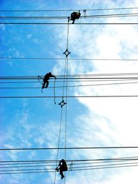 Low angle view of electricity pylon