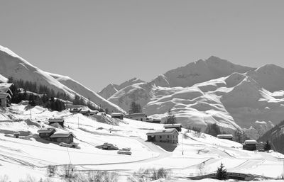 Snow covered mountains against sky