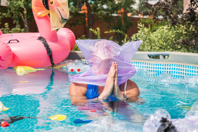 Woman swimming in pool