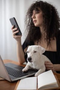 Young woman using mobile phone