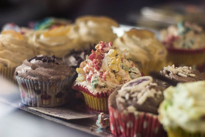 Close-up of cupcakes served on table