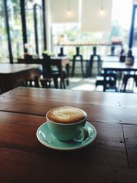 Coffee cup on table