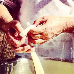 Close-up of hand holding ice cream