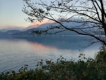 Scenic view of lake against sky during sunset