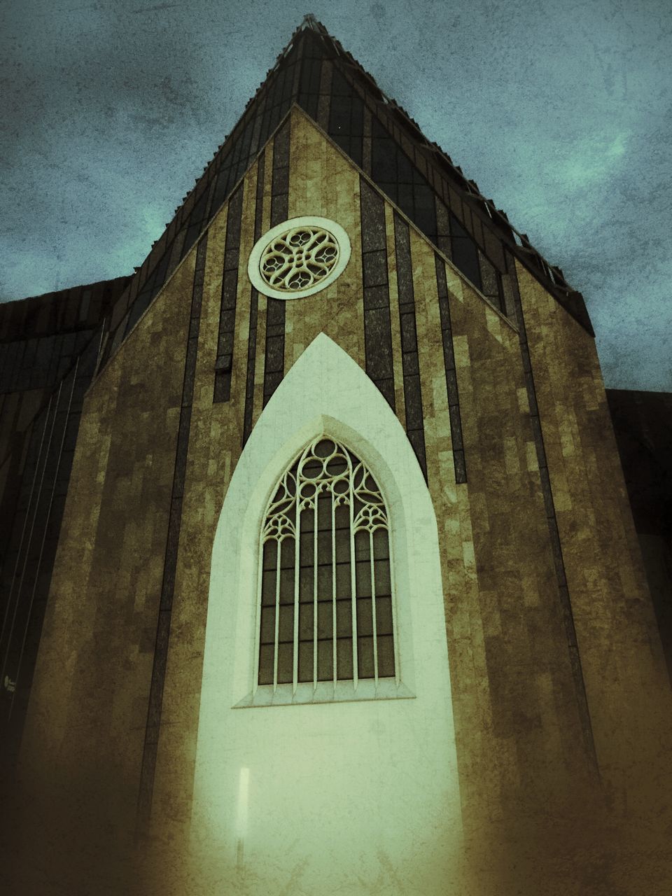 architecture, building exterior, built structure, low angle view, sky, window, church, religion, facade, arch, place of worship, building, cloud - sky, no people, outdoors, spirituality, day, old