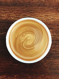 High angle view of cappuccino on table