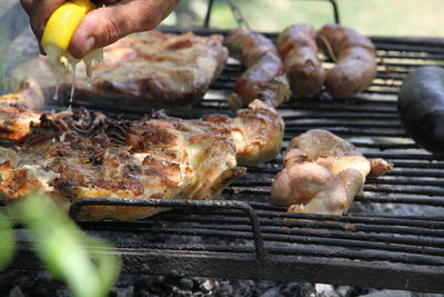 Close-up of meat on barbecue grill