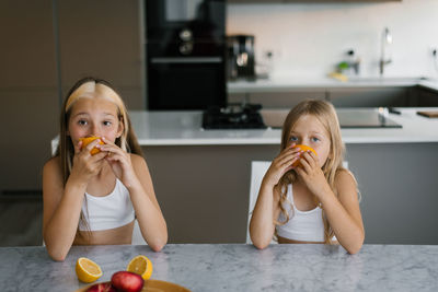 Young woman drinking juice