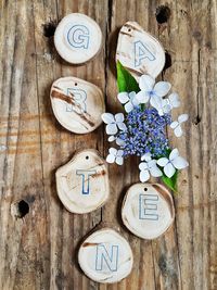 Close-up of wooden flower on wall