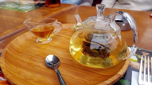 Tea in pot on cutting board