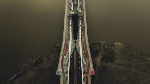 High angle view of ship on sea against mountain