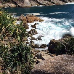 Scenic view of rocks in sea