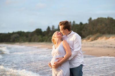 Happy couple on beach