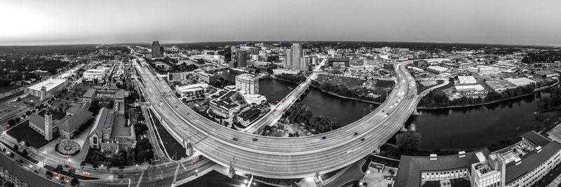 High angle view of buildings in city against sky