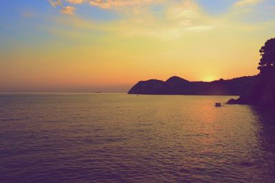 Scenic view of sea at sunset