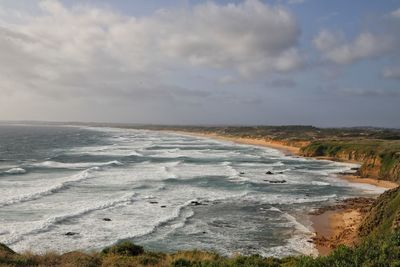 Scenic view of beach against sky