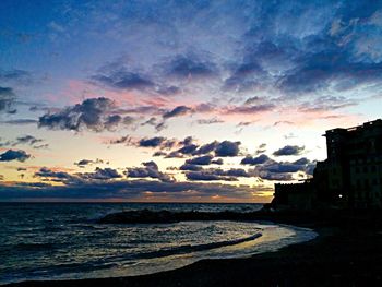 Scenic view of sea against cloudy sky