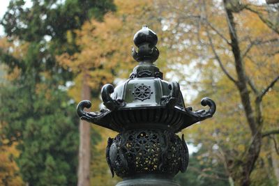 Close-up of old sculpture in park