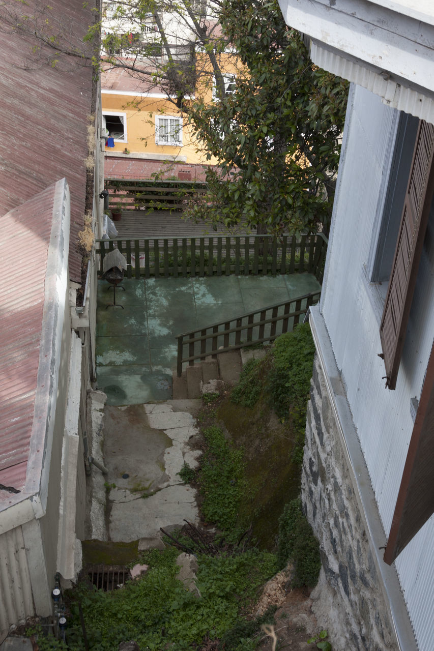 HIGH ANGLE VIEW OF STAIRCASE BY BUILDING