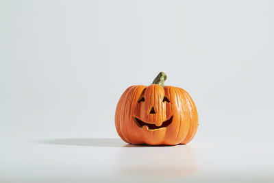 Close-up of pumpkin against gray background
