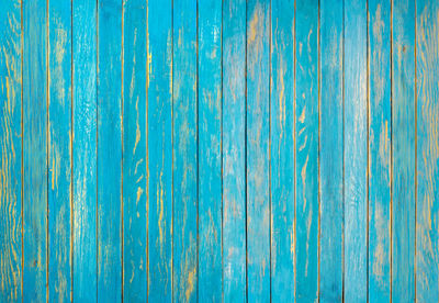 Texture of the old shabby sky blue wooden boards. the surface wood paneling pattern. wooden fence.