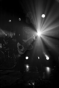 People playing guitar at night