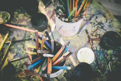 High angle view of art and craft equipment on table