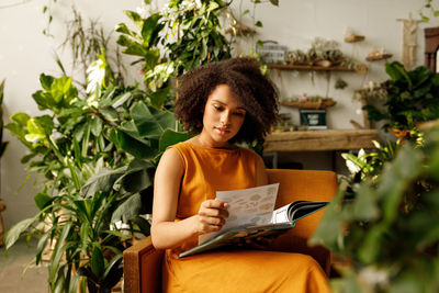 Teenage girl sitting on chair