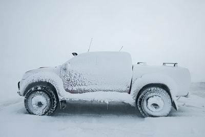 Picture of a customised and snowed in truck in north iceland