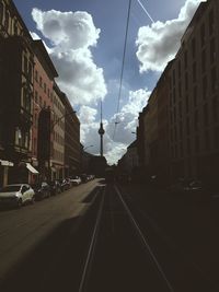 View of road against cloudy sky