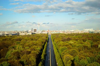 View of city against cloudy sky